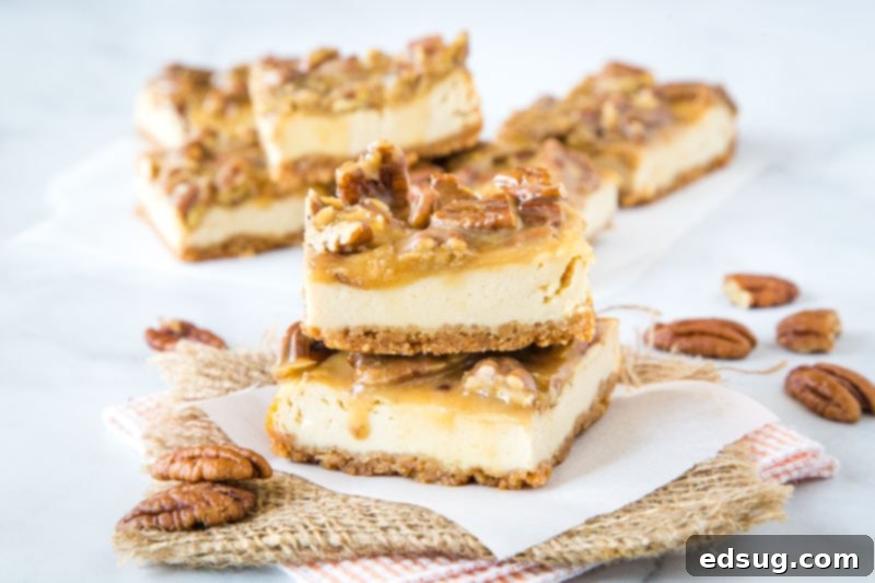 pecan praline bars stacked on napkin