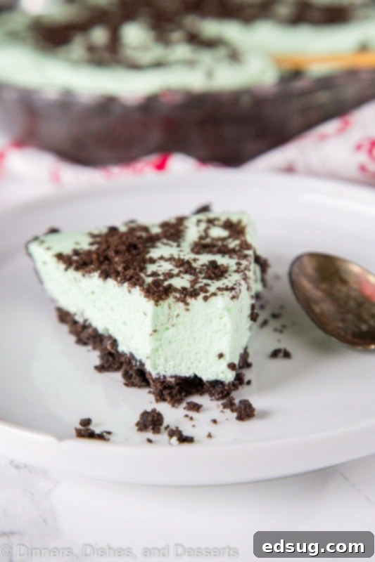 slice of mint pie with bite taken out of it
