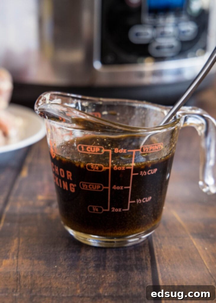 homemade teriyaki sauce on a measuring cup
