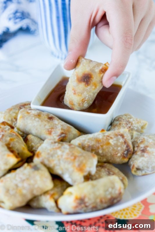 baked wontons dipping in chili sauce