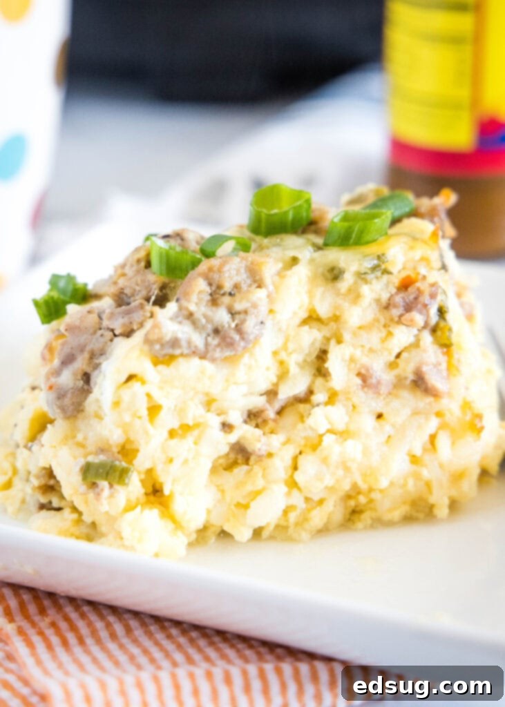 Overnight Slow Cooker Breakfast Bake 2 sausage breakfast casserole on plate