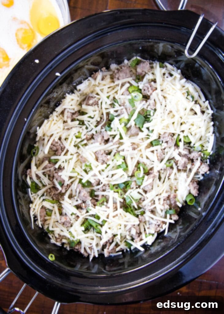 Overnight Slow Cooker Breakfast Bake 4 breakfast casserole in the crock pot ready for eggs