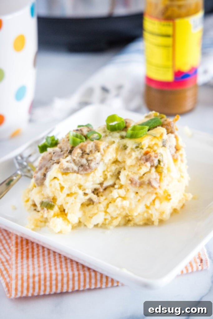 Overnight Slow Cooker Breakfast Bake 6 breakfast egg bake with sausage on a plate