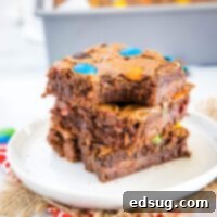 close up of brownies with a bite out of one