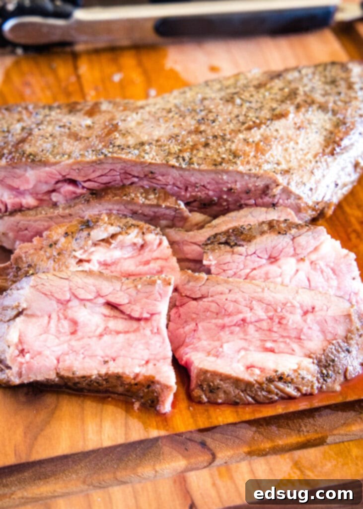 close up of sliced tri tip on cutting board
