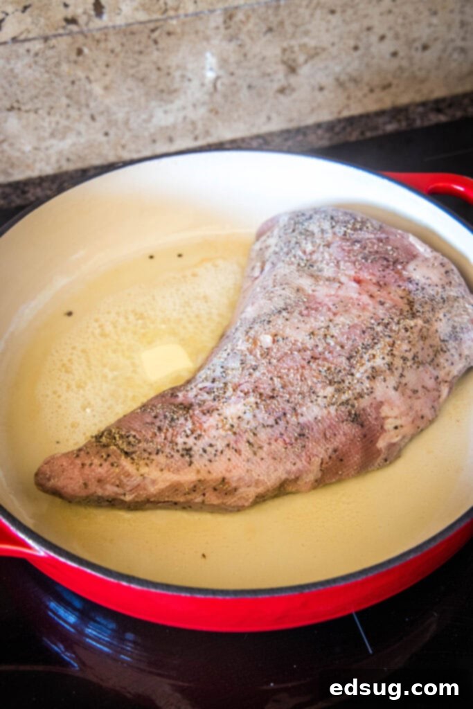 cooked tri tip searing in pan