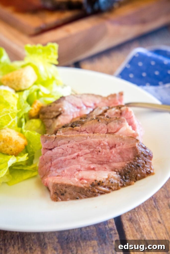 sliced tri tip on plate