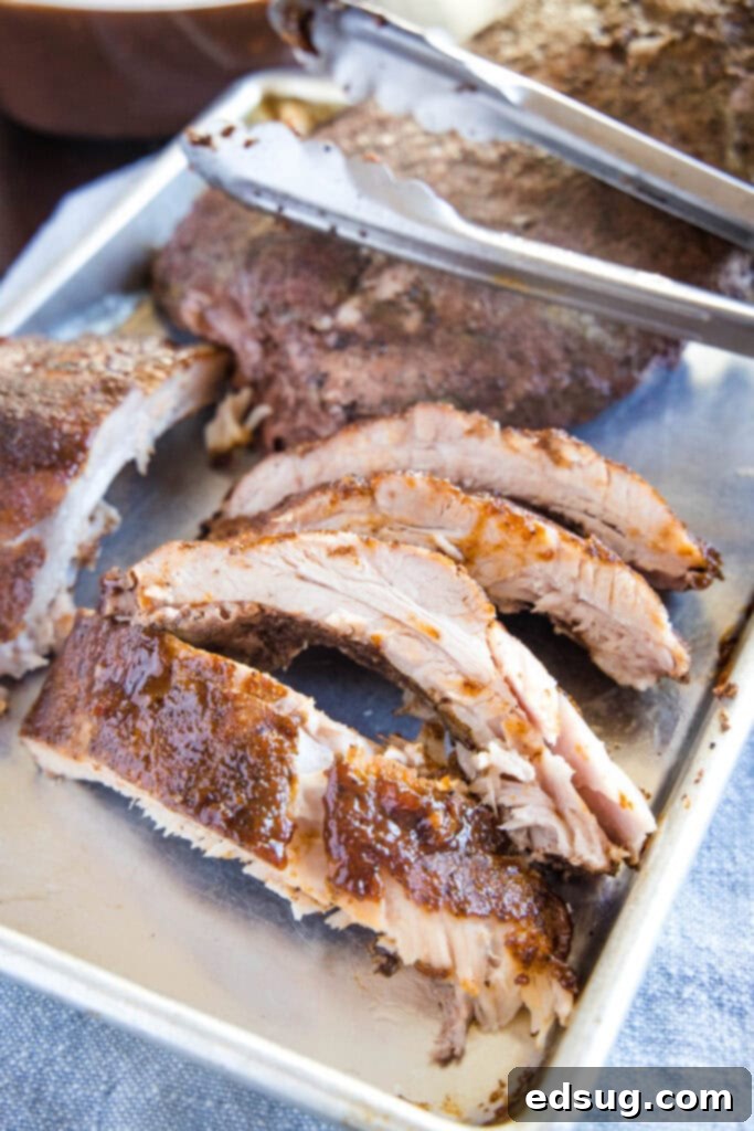 sous vide ribs on baking sheet cut up