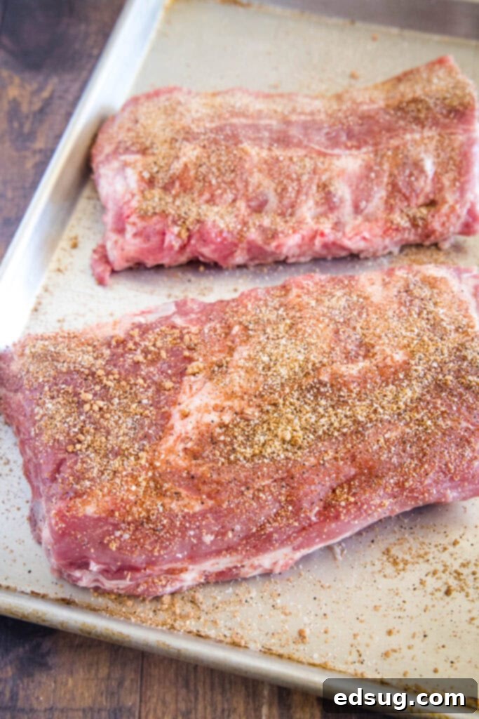 seasoned ribs on baking sheet