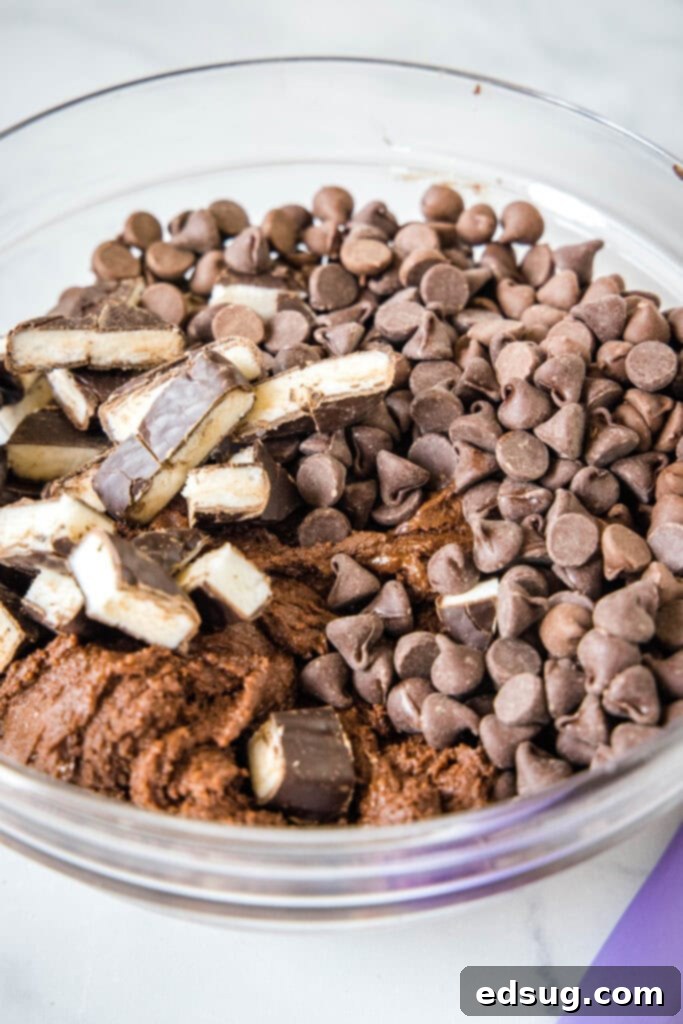 Peppermint Fudge Dreams 4 adding chocolate chips and chopped peppermint patties to chocolate cookie dough