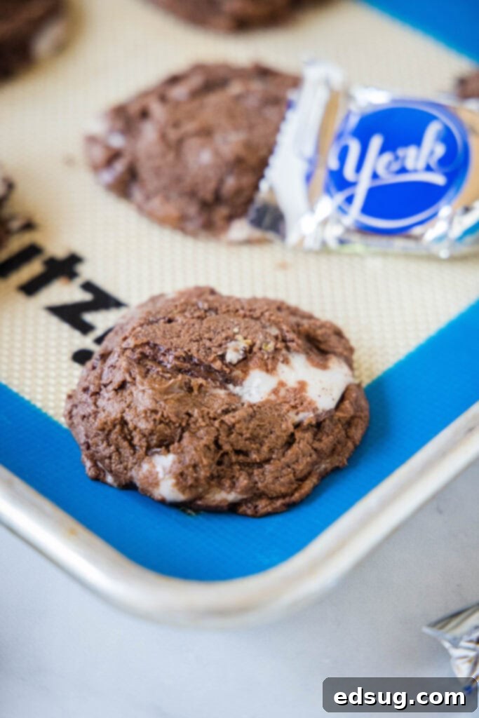 Peppermint Fudge Dreams 5 baked peppermint patty cookie on a baking sheet