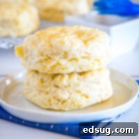 Close up homemade biscuits stacked on a plate