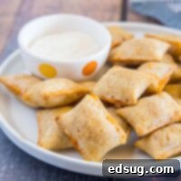 close up of pizza rolls on a plate