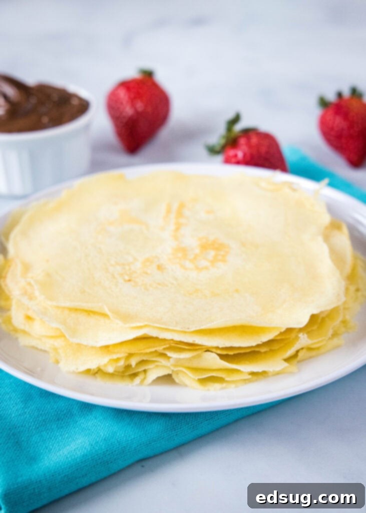 a stack of freshly cooked crepes