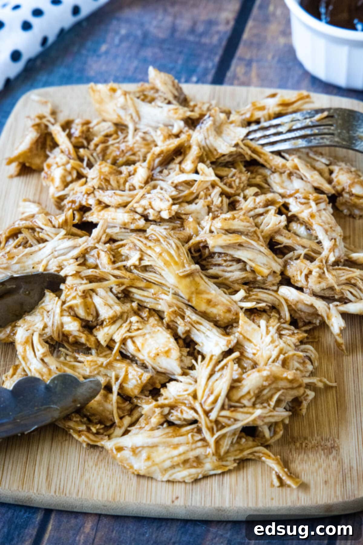 Effortless Instant Pot BBQ Chicken 2 shredded chicken on a cutting board, ready to be served