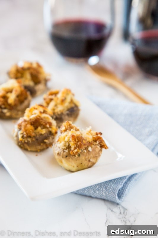 sausage stuffed mushrooms on a plate
