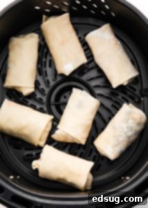 Canyon Crunch Rolls 12 egg rolls in air fryer basket
