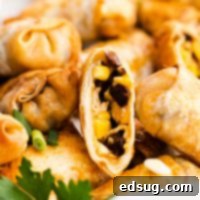 Canyon Crunch Rolls 8 close up of egg roll cut open to see filling