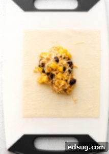 Canyon Crunch Rolls 10 placing filling in egg roll wrapper