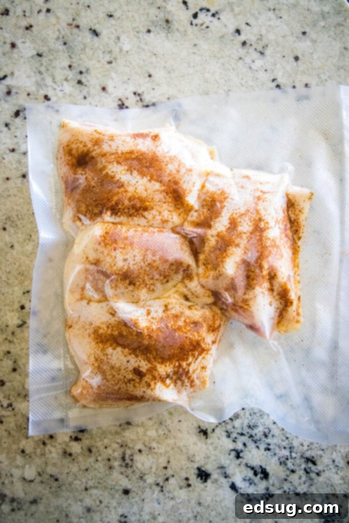 chicken thighs seasoned in a vacuum sealed bag