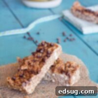 Sweet and Salty Chocolate Peanut Butter Granola Bars 2 A close-up shot of a single Chocolate Peanut Butter Granola Bar