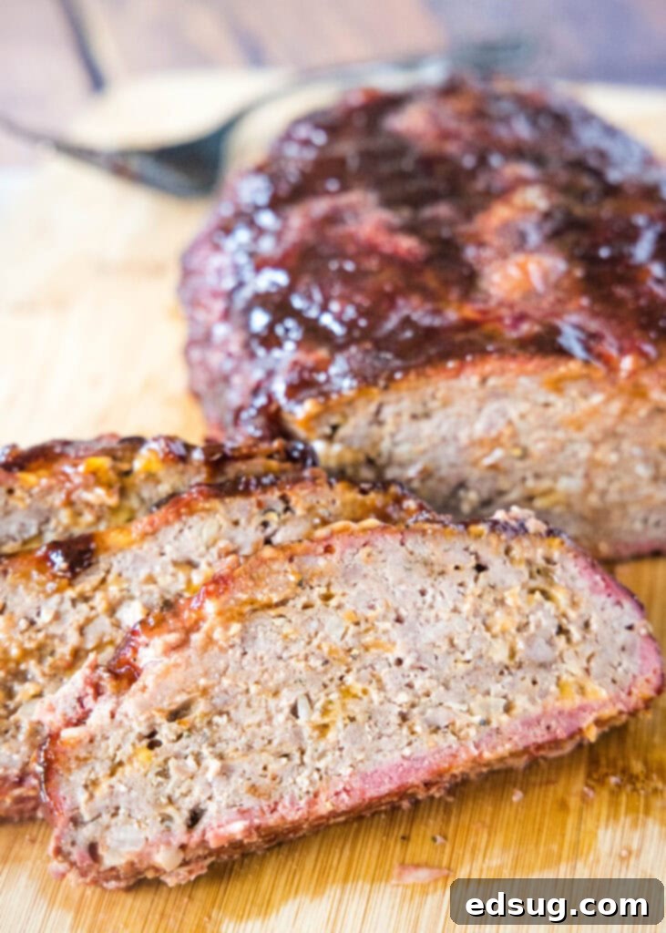 sliced meatloaf on a cutting board