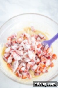 Luscious Strawberry Loaf 8 adding strawberries to the batter