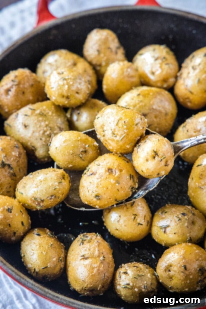 a spoonful of potatoes from the skillet