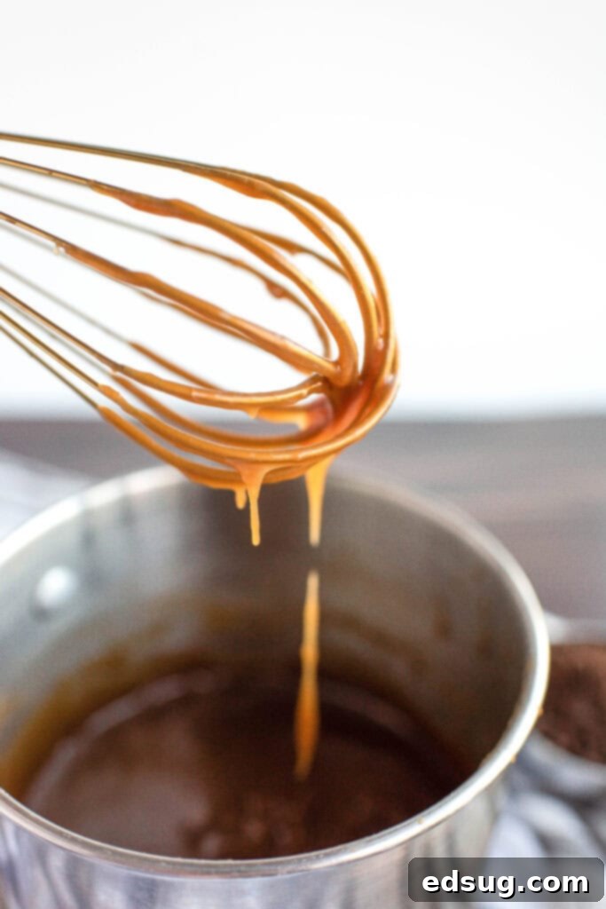 caramel sauce on a whisk