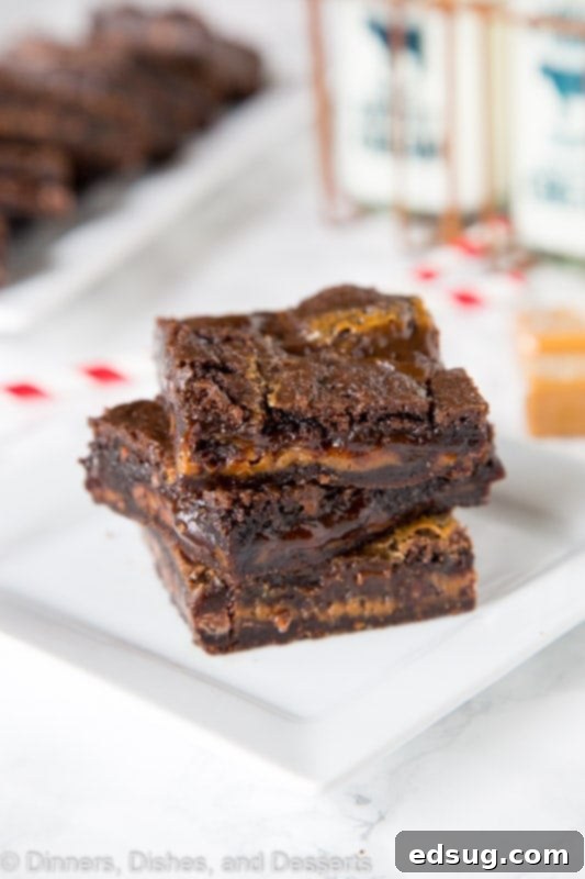 Caramel Layer Bars cut into squares, showing off the golden caramel.
