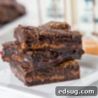 Caramel Layer Bars - rich and chocolate brownie filled with chocolate chips and gooey caramel. You will not be able to stay away from them!