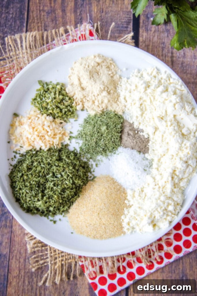 A selection of individual dried herbs and spices laid out for homemade ranch dressing mix
