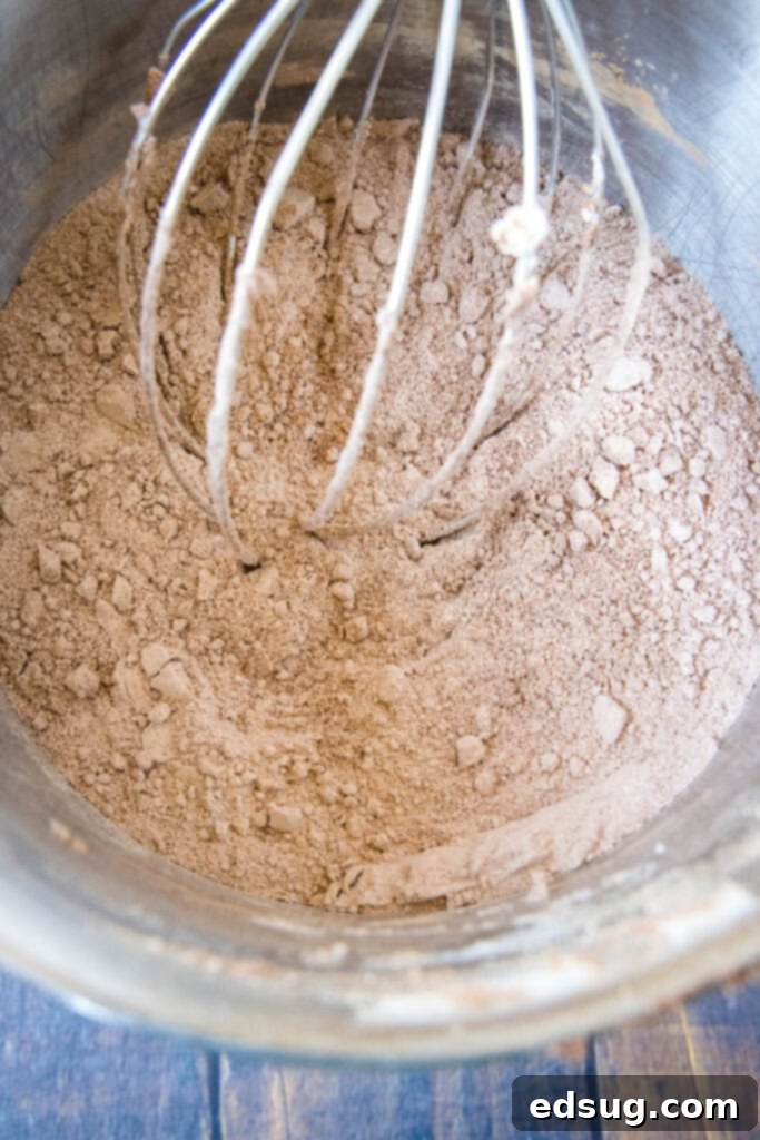 Craft Your Own Brownie Magic 4 brownie mix in mixer with whisk