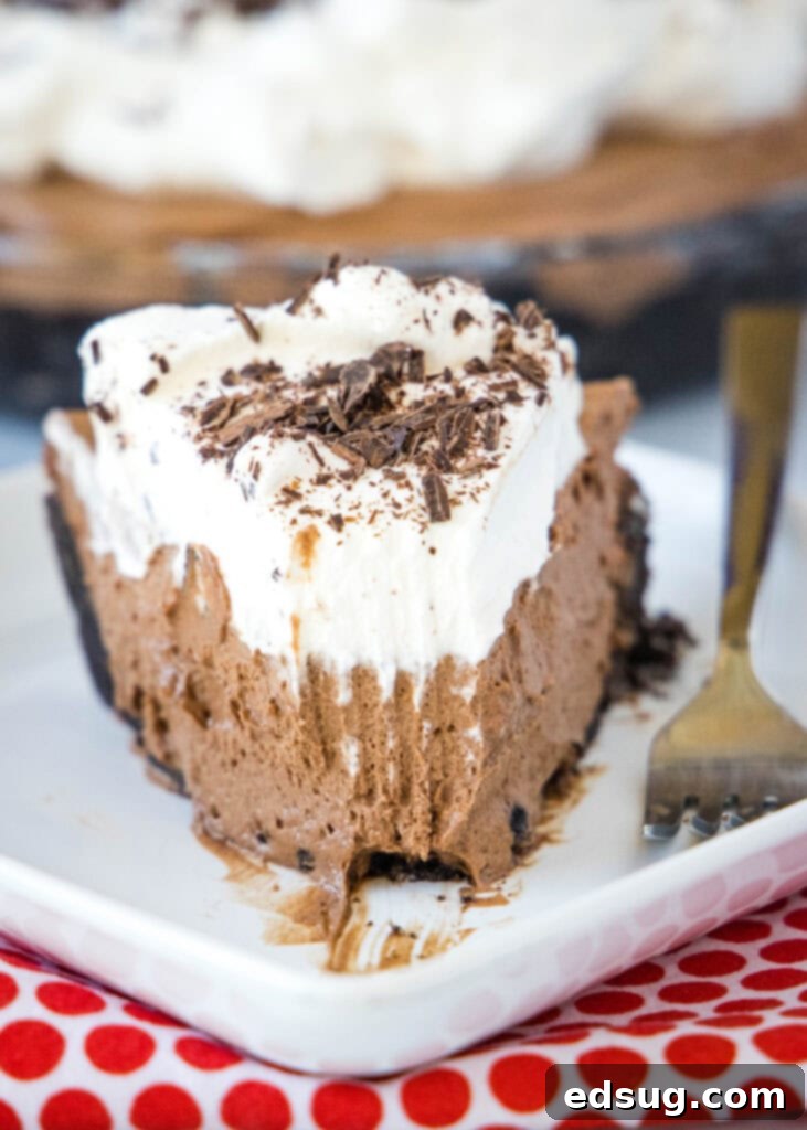 Ultimate Chocolate Indulgence Pie 2 chocolate pie with bite taken out of it