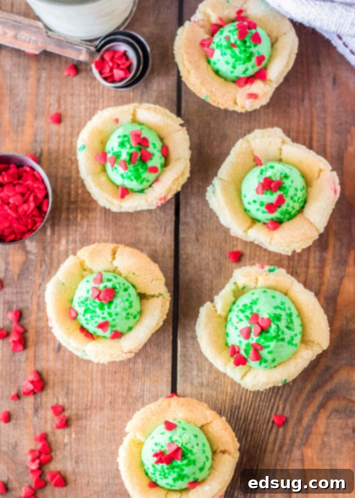 Grinchmas Sugar Cookie Bites 5 looking down on a board with grinch sugar cookie cups sitting on it