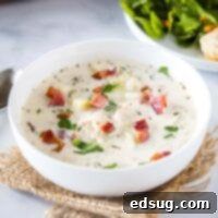 cropped in close up of a bowl of clam chowder