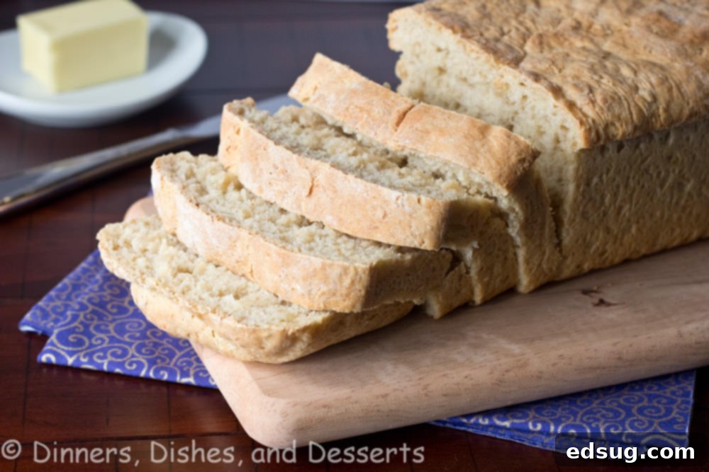 Freshly baked Classic Oatmeal Bread cooling on a rack
