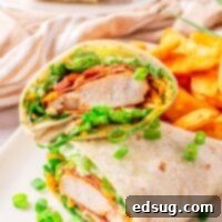 Signature Chicken Bacon Ranch Wrap 7 cropped in close up of chicken bacon ranch wrap
