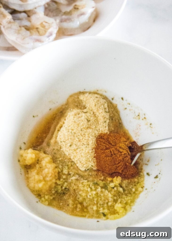 Golden Crispy Shrimp 4 baked shrimp topping mixture in a bowl