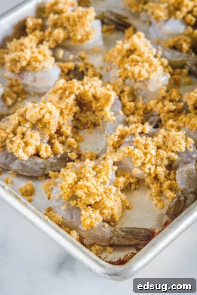 Golden Crispy Shrimp 5 shrimp topped with breadcrumb mixture ready for the oven