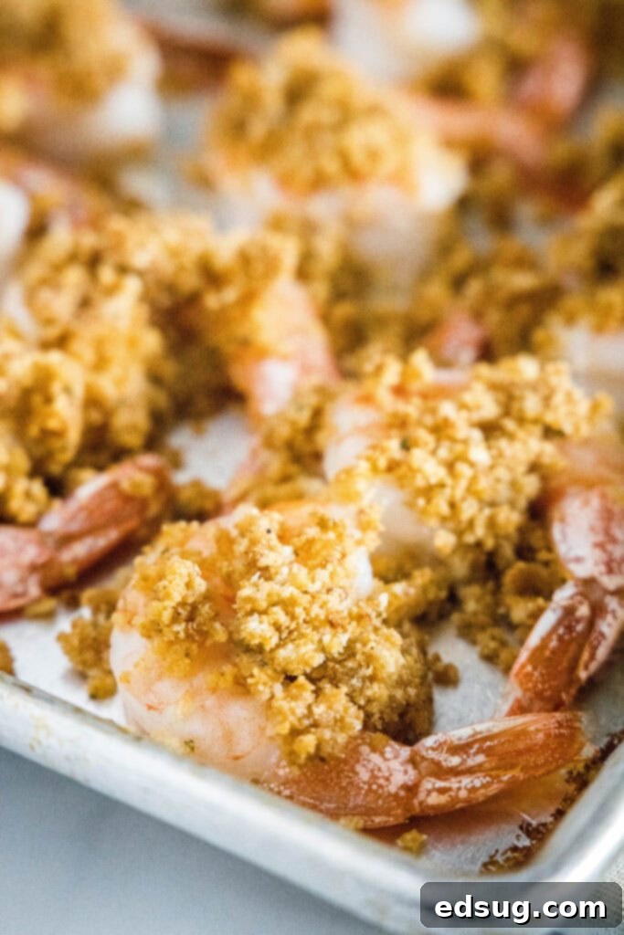 Golden Crispy Shrimp 6 crispy baked shrimp on a baking sheet
