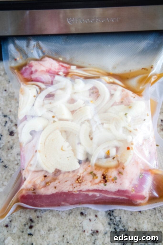 corned beef brisket in bag with onions and beef broth