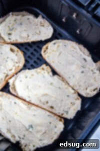 garlic bread in an air fryer basket