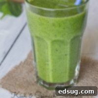 kiwi and spincah smoothie in a cup