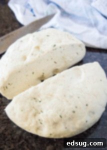 Aromatic Rosemary Focaccia 9 bread dough divided into 2 balls on the counter