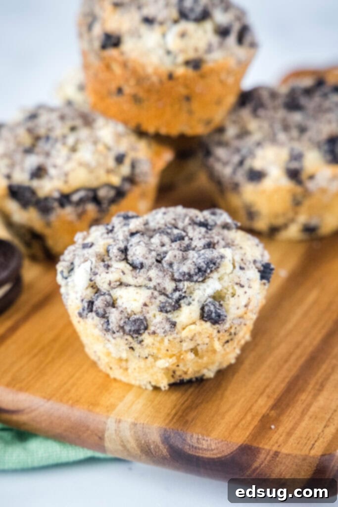 oreo muffin on a board with more stacked behind it