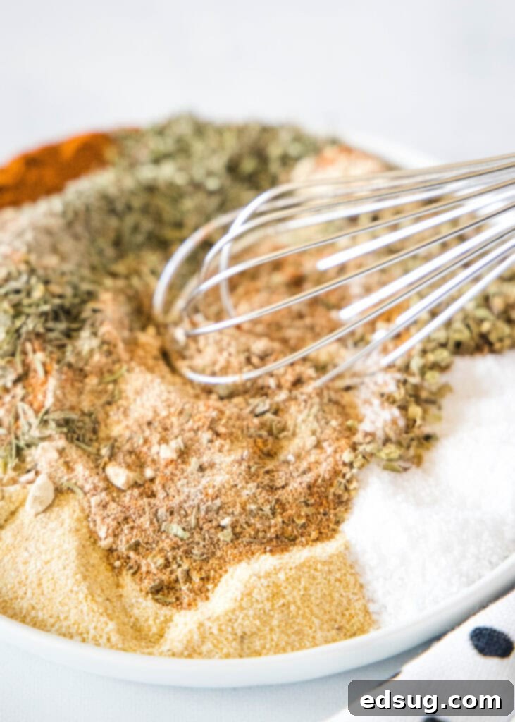 spices being mixed together on a plate