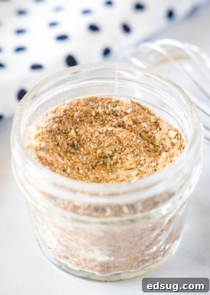 a jar filled with pork chop seasoning