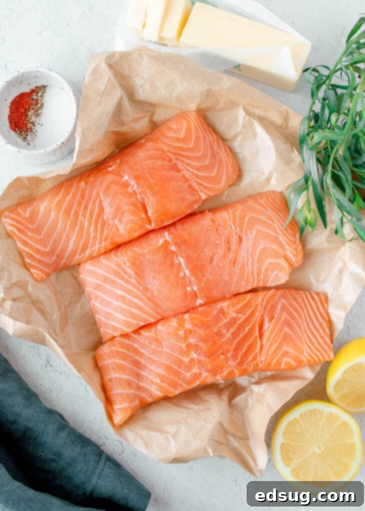 Seared Salmon Perfection 3 Ingredients for pan-seared salmon including salmon fillets, herbs, lemon, and spices