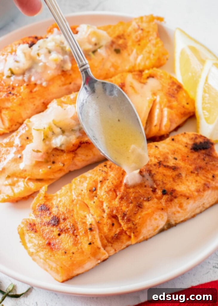 Seared Salmon Perfection 5 Pan seared salmon being drizzled with rich tarragon butter sauce